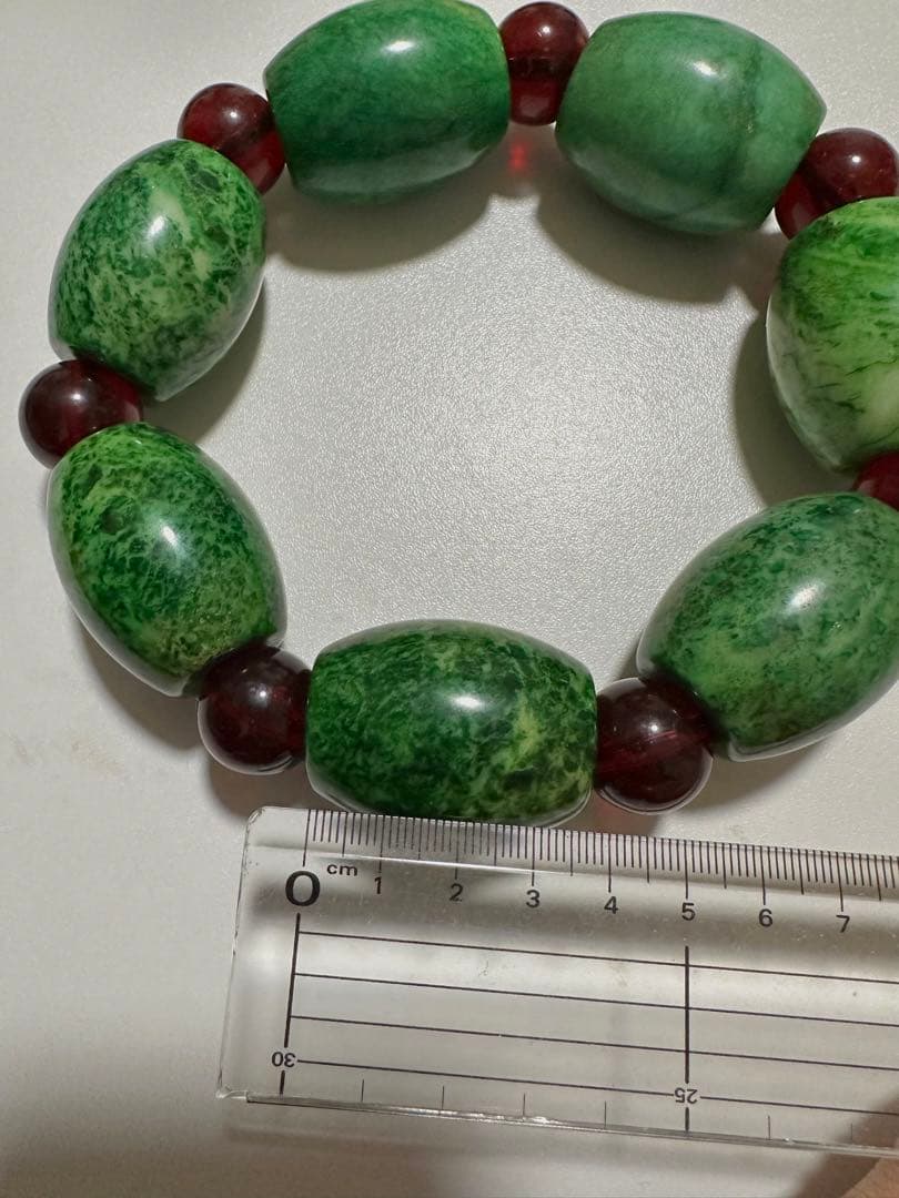 モンゴル産 翡翠 ドラム型 大穴ビーズの連(琥珀入り) 47cm