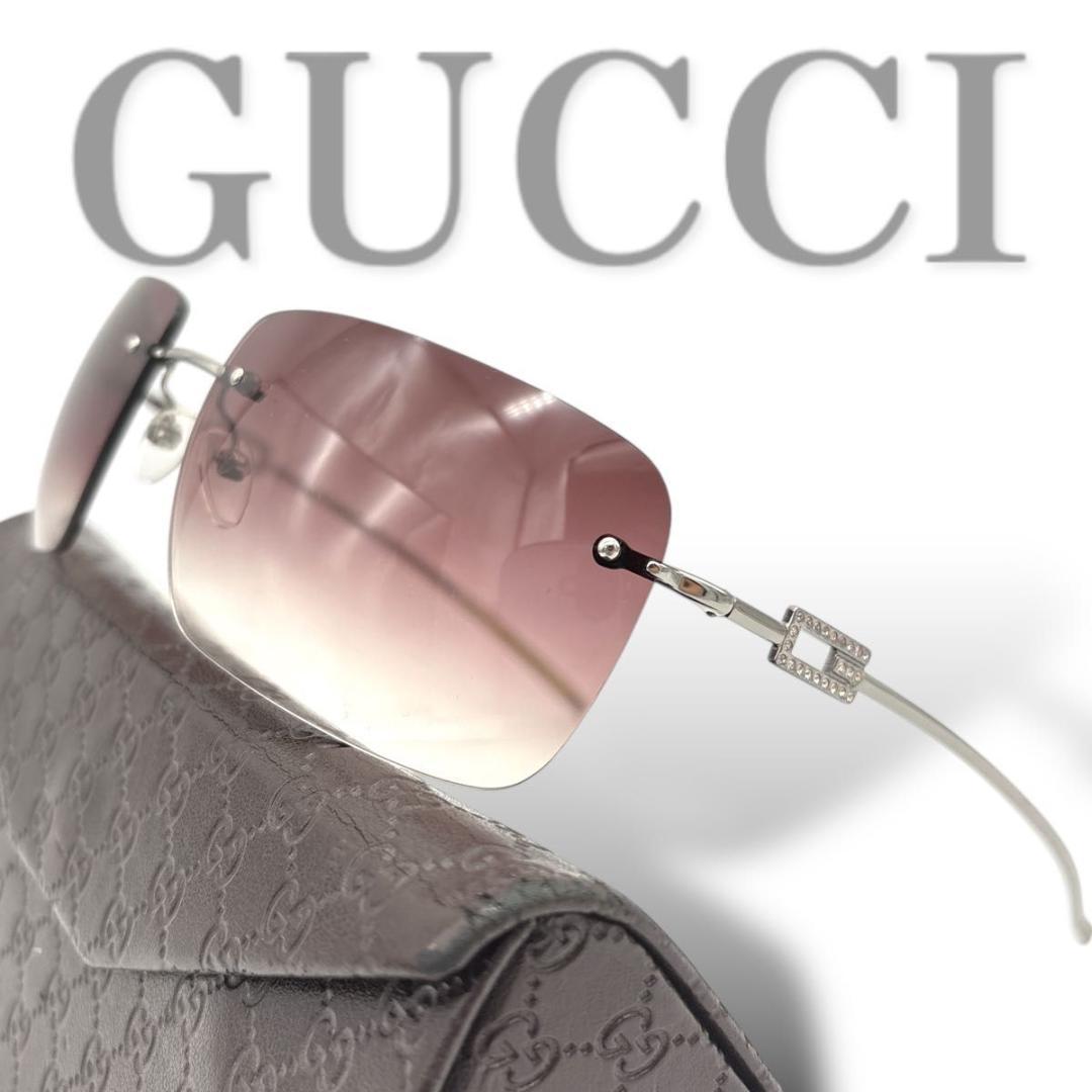小物 GUCCI sunglasses rimless stone silver