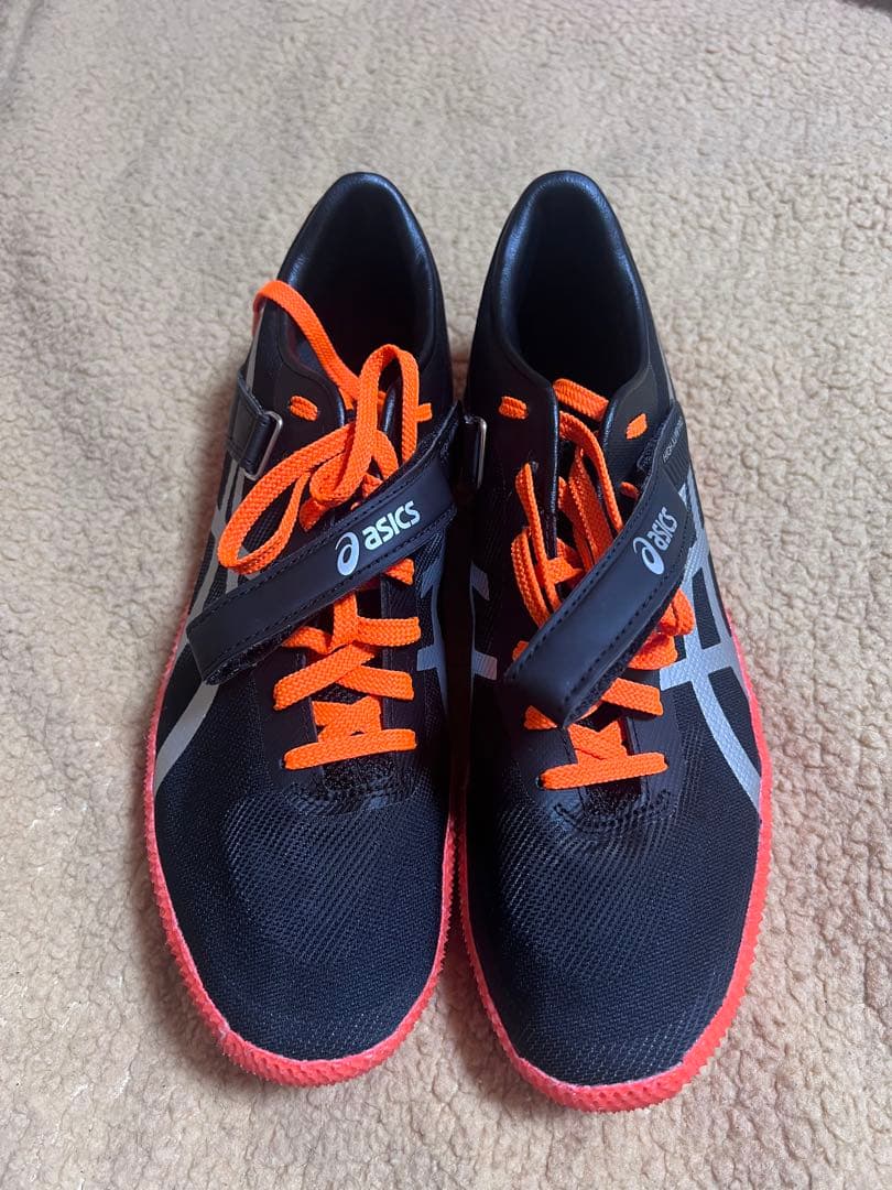 ASICS スパイクシューズ 黒/オレンジ