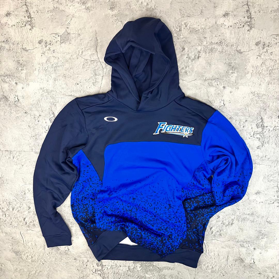 北海道日本ハムファイターズ フリースパーカー オークリー 古着 刺繍 紺青 XL