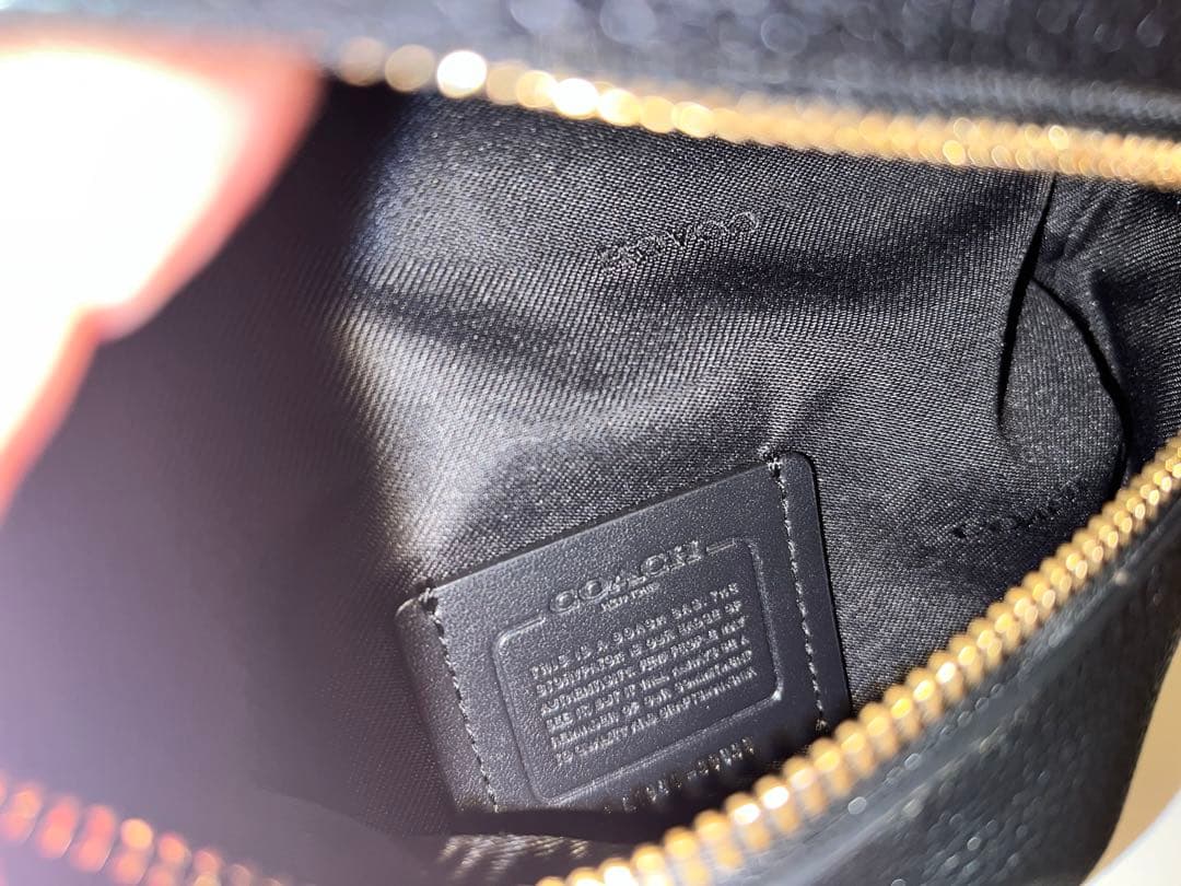 COACH ブラック ボディバッグ　レディース