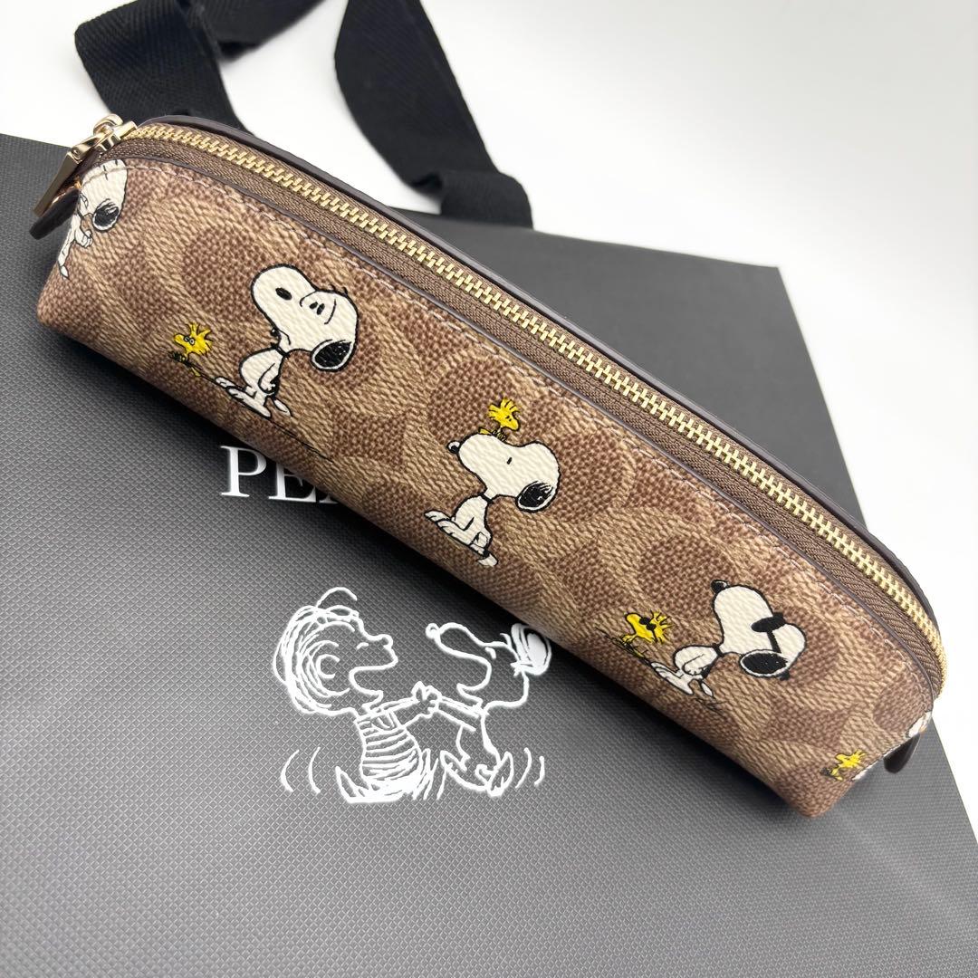 【COACH X PEANUTS】ペンシル ケース！スヌーピー 紙袋付き！