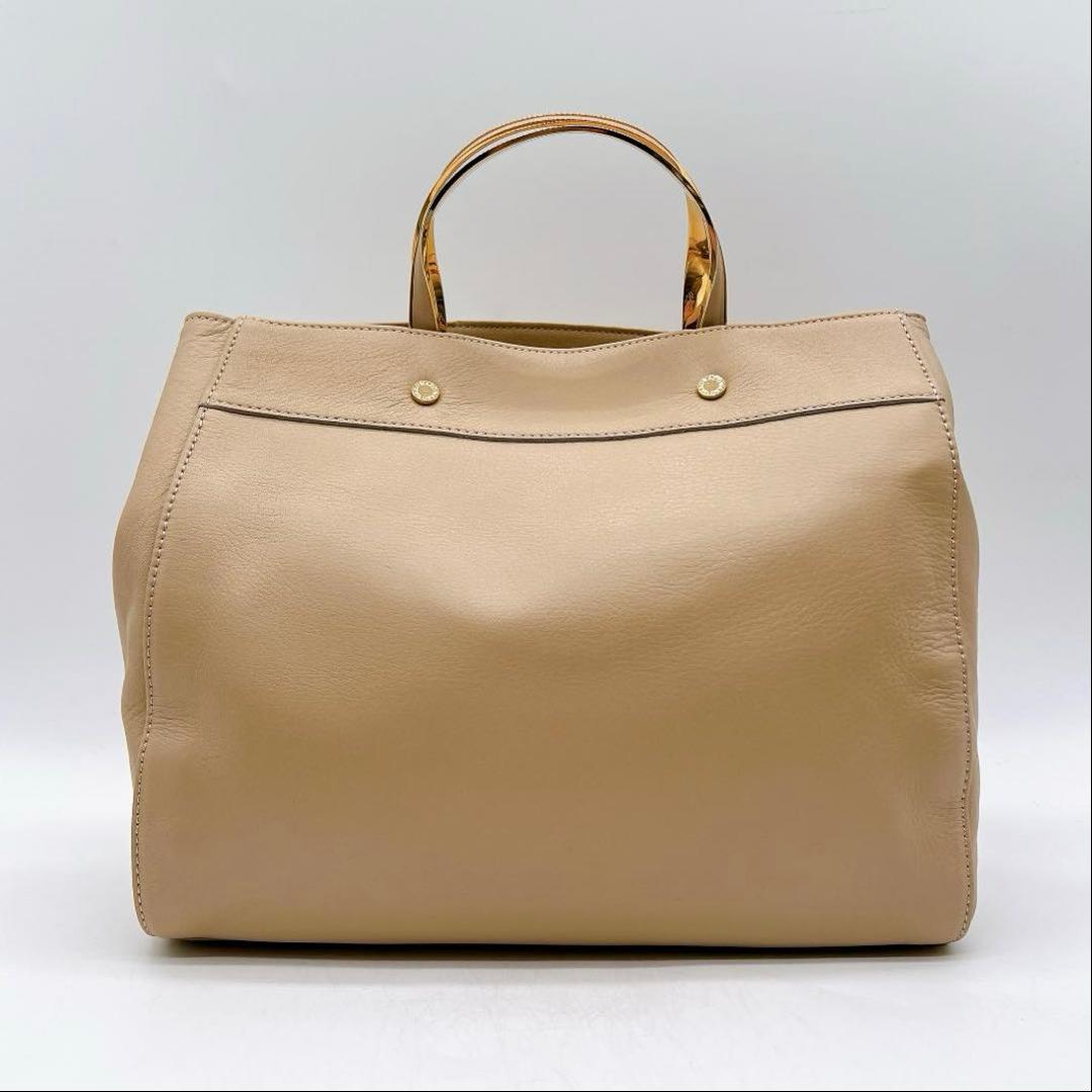 極美品WAKO ゴールドハンドル ハンドバッグ タッセル レザー f557