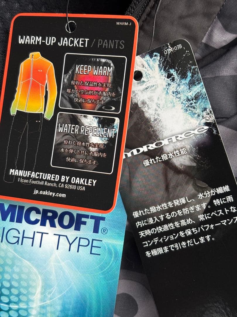 【新品未タグ付】オークリー ウインドブレーカー（上L・下M）保温 撥水 静音機能