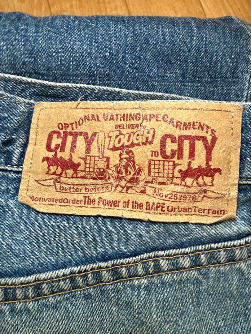 【服と書いて人】A BATHING APE 顔プリントデニムパンツ