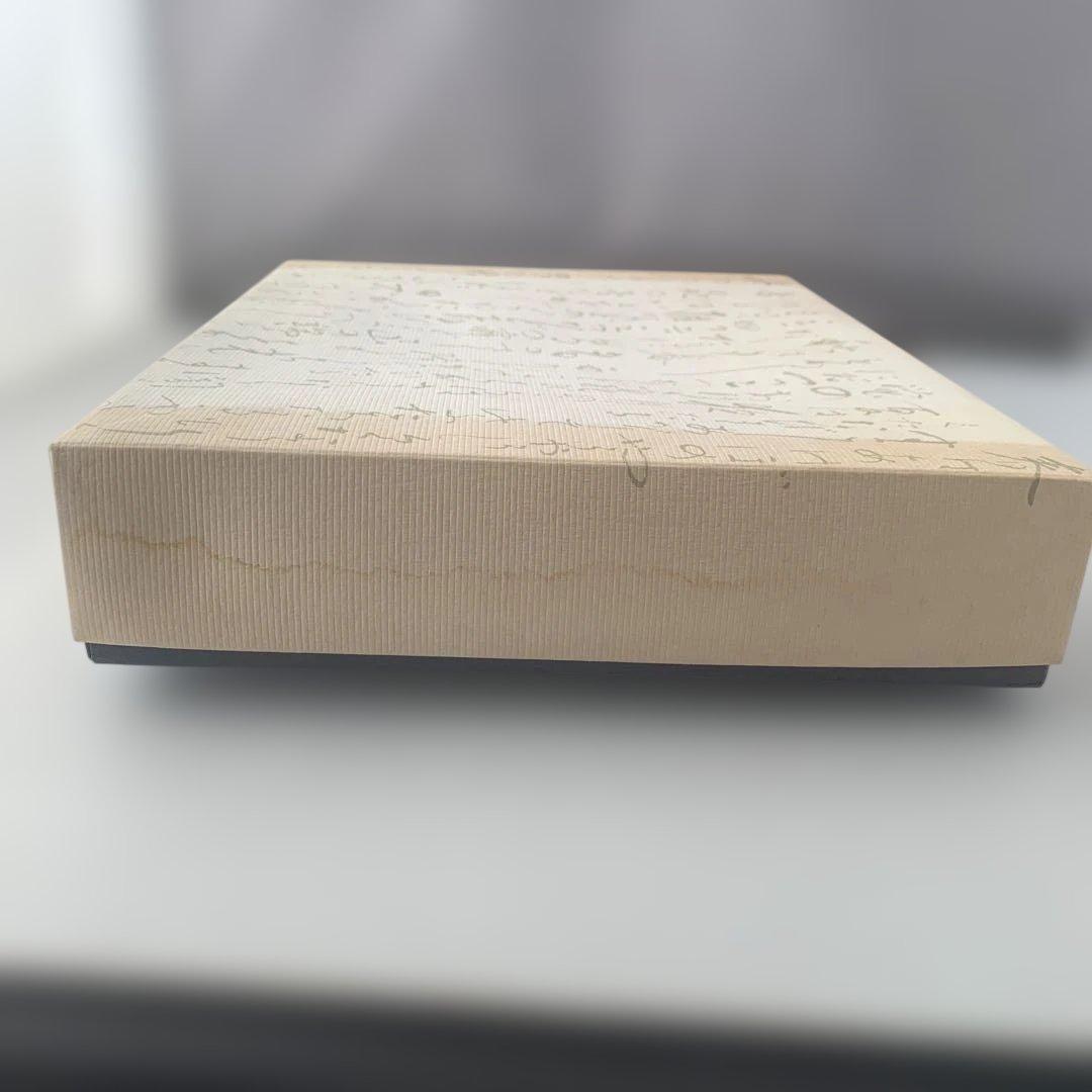 【箱付き】赤頭巾を被った大男の面、裏面は春画