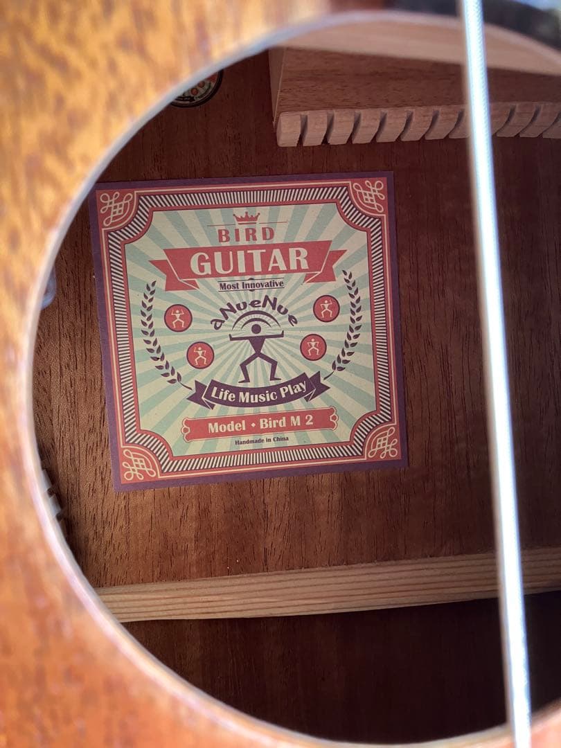 ミニギター　アヌエヌエM2 ハーモニカホルダー付けます。