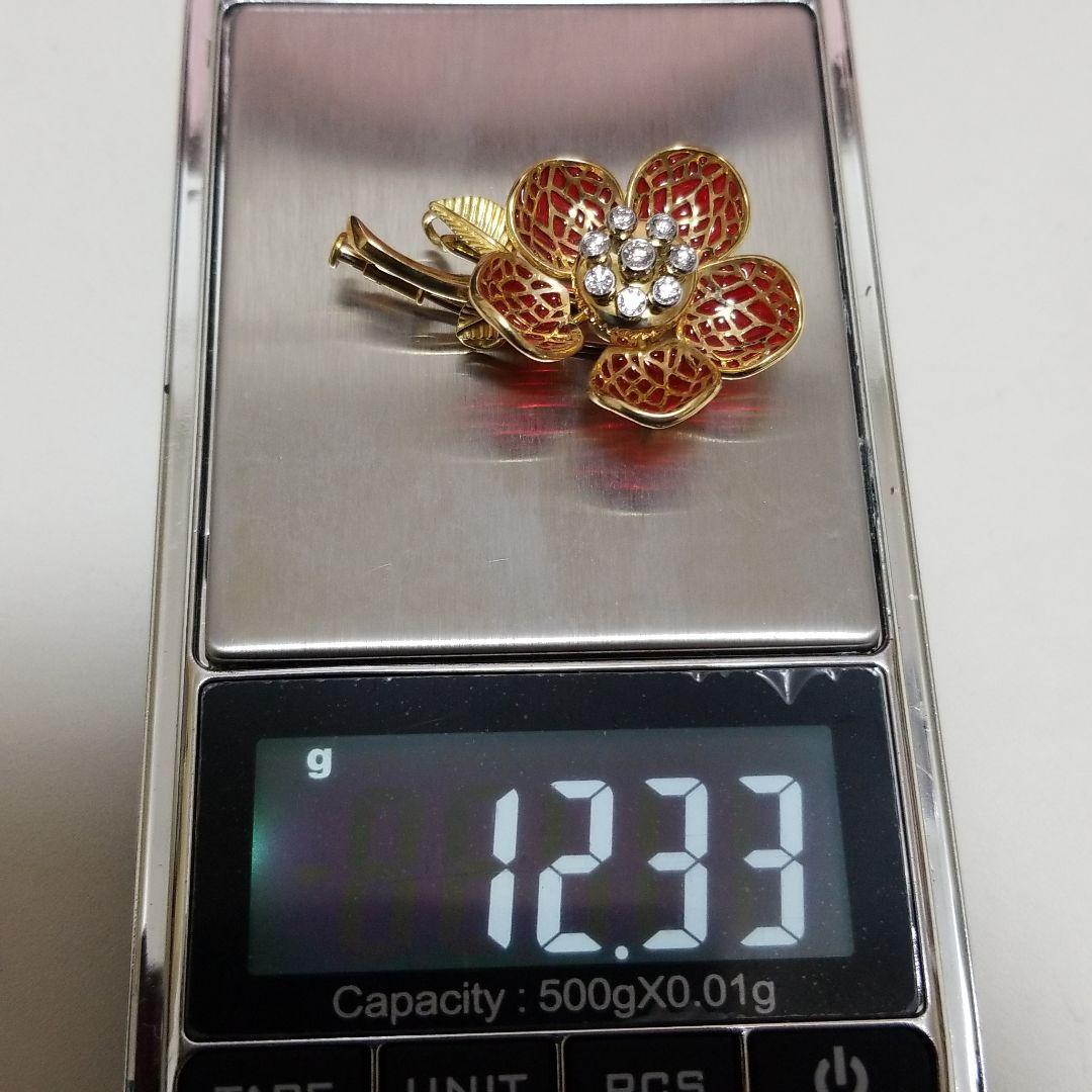 平和堂貿易　動く　ブローチ　刻印　あり　金　750　PT950　0、28カラット