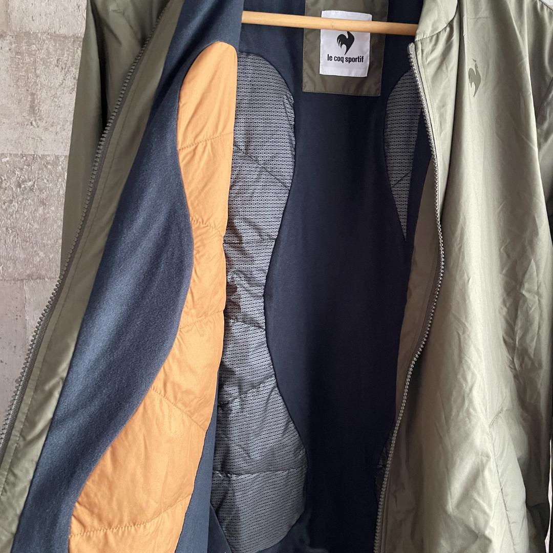 新品 le coq スマートパディングジャケット ヒートナビ カーキ L