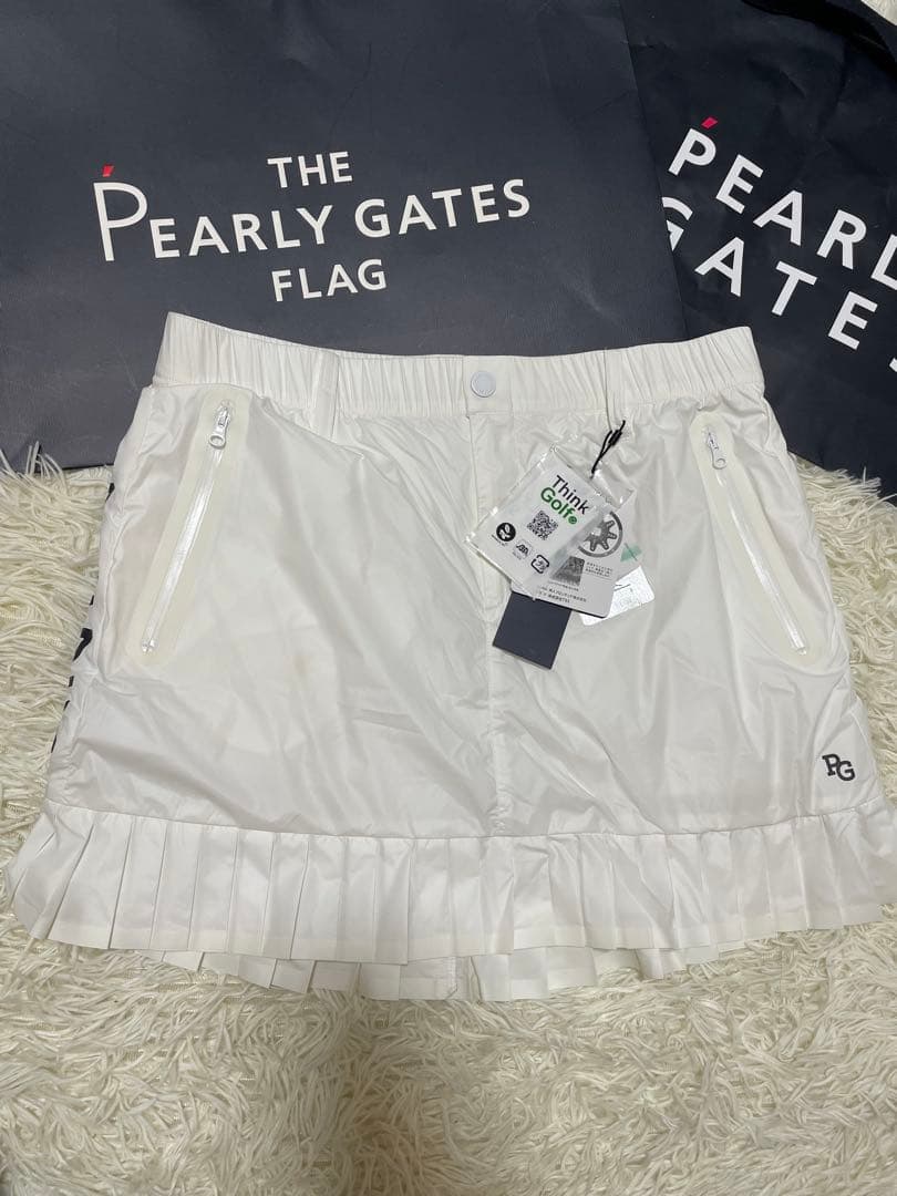 パーリーゲイツ 【軽量保温】バックロゴプリーツ切替タフタスカートサイズ2