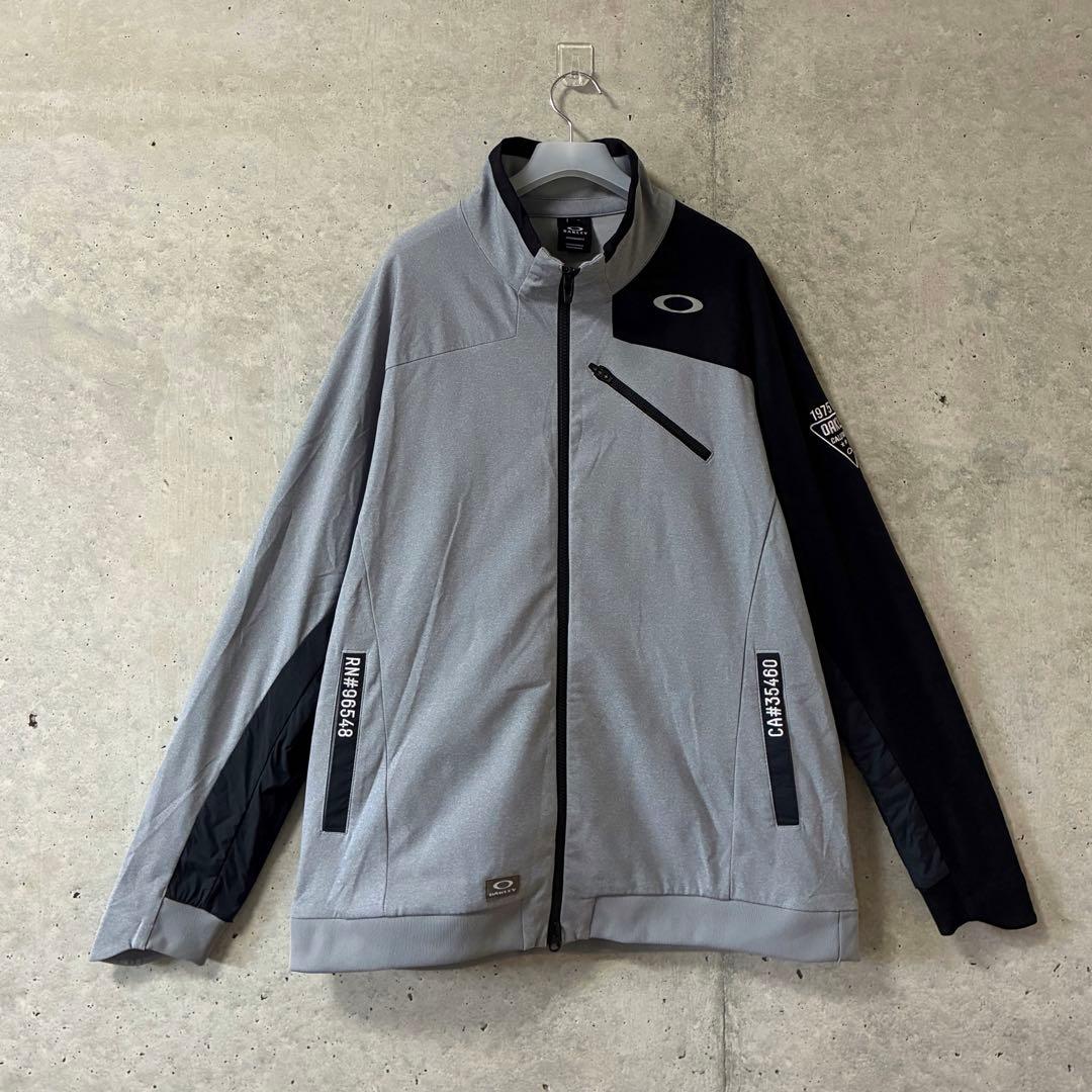 OAKLEY ゴルフウェア ジャケット ブルゾン ジップ 刺繍 グレー 2XL