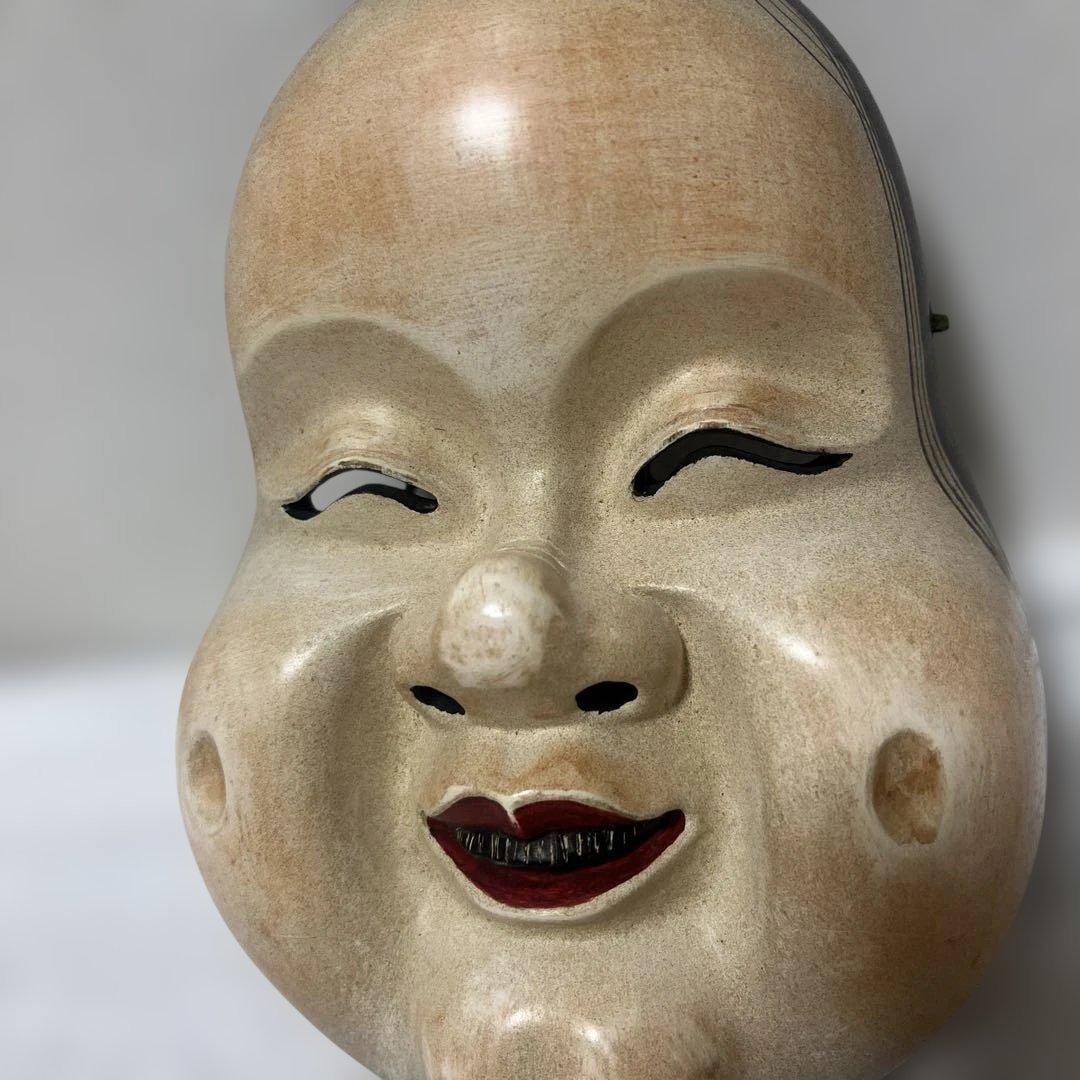 伝統的な能面 笑顔の木製お面