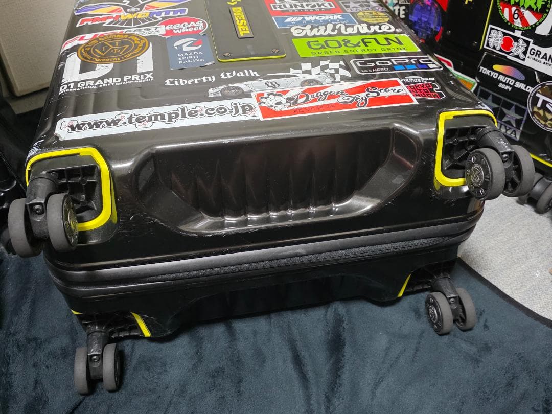 サムソナイト | ネオパルス×ディーゼル スピナー75 Black/Yellow