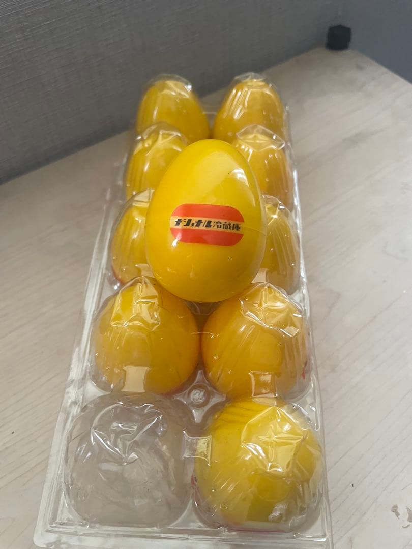 ナショナル冷蔵庫　黄色のおもちゃ入りプラスチック卵 10個セット