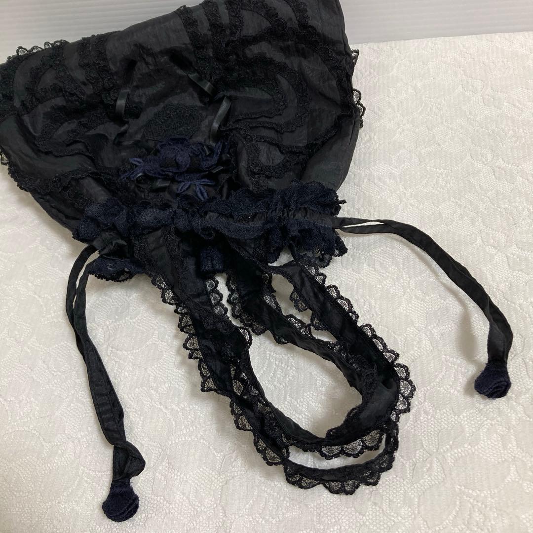 さえら　ヒスクローネ 黒色の手提げ