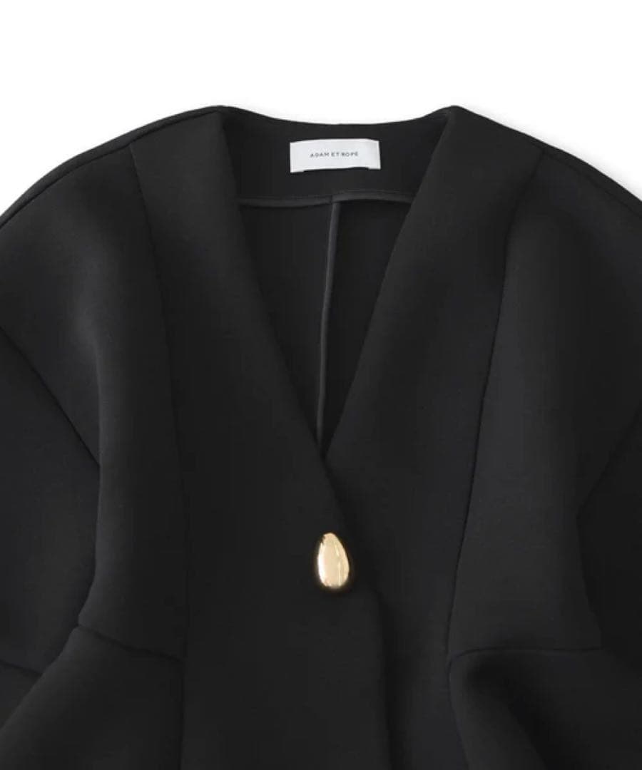 エッグブローチ付きペプラムカーディガン