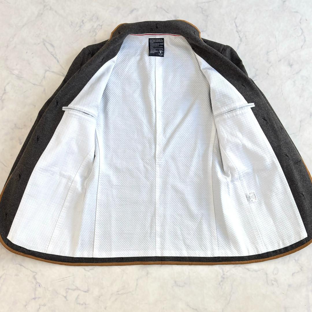 マークアンドロナ ジャケット 刺繡ロゴ パイピング 金ボタン グレー tw5