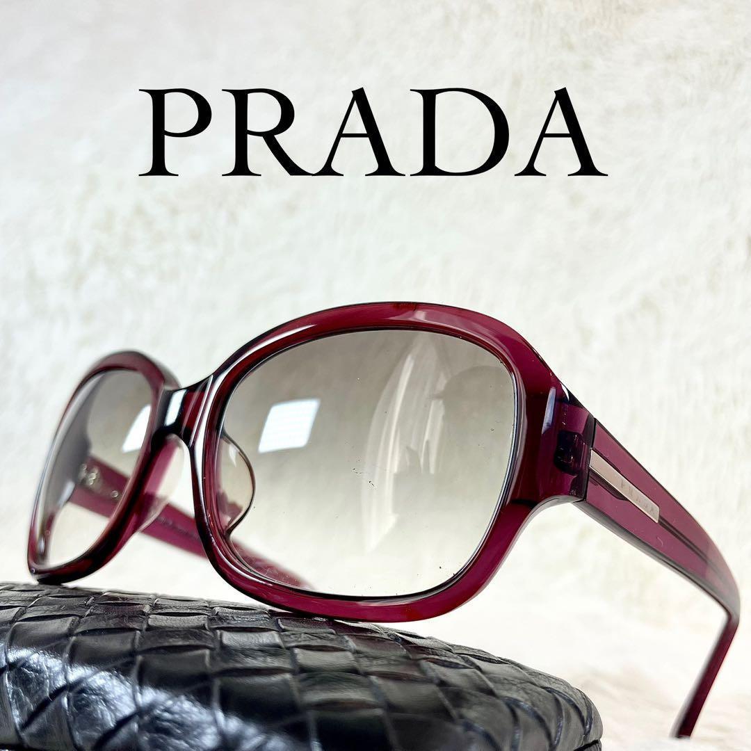 美品　PRADA　サングラス　SPR26G　ブラウンレンズ　レッドクリアフレーム