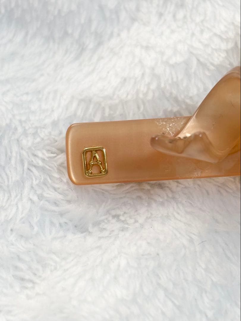 ALEXANDRE DE PARISストーン付きベージュリボンクリップ