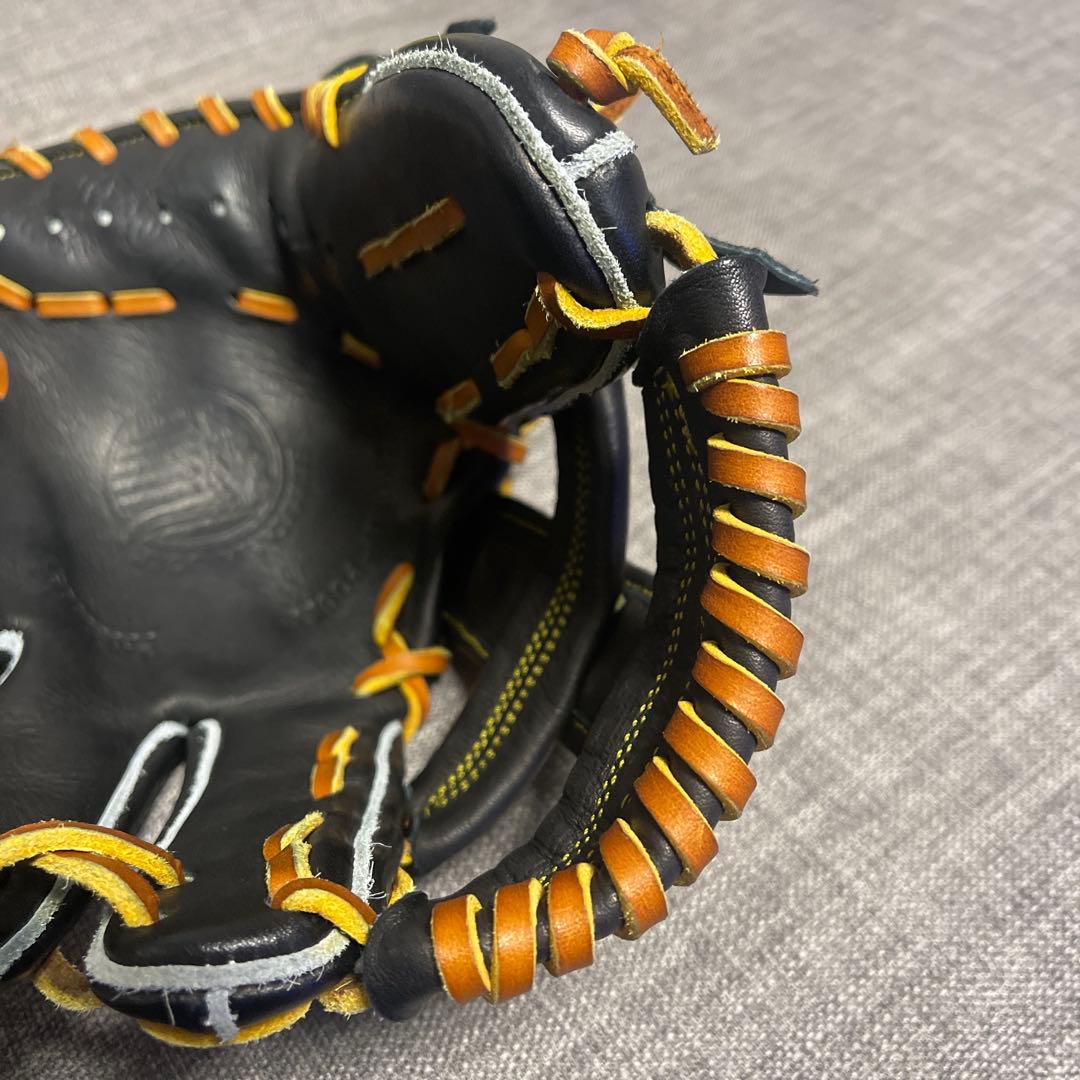 ず*な様 久保田スラッガー 軟式グローブ 黒/オレンジ　内野手用