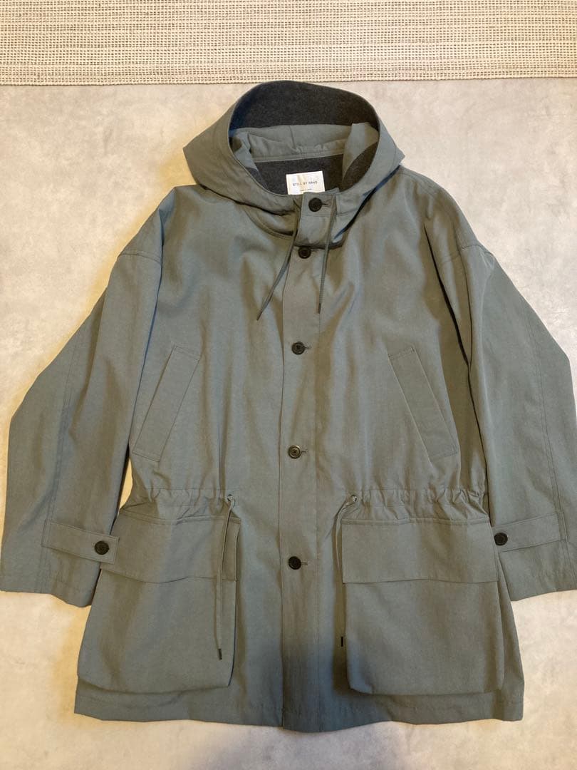 STILL BY HAND スティルバイハンド　塩縮ナイロンハーフコート