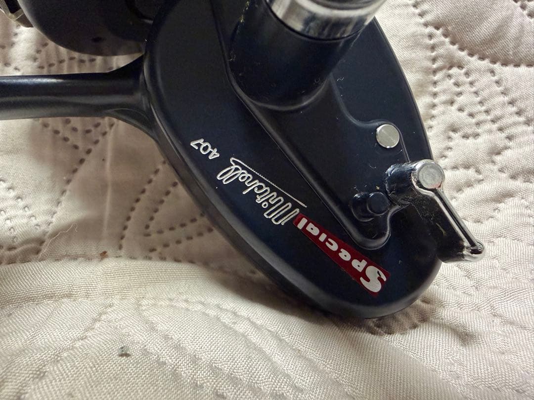 ④ Mitchell ミッチェル 407 スピニングリール 黒　新品