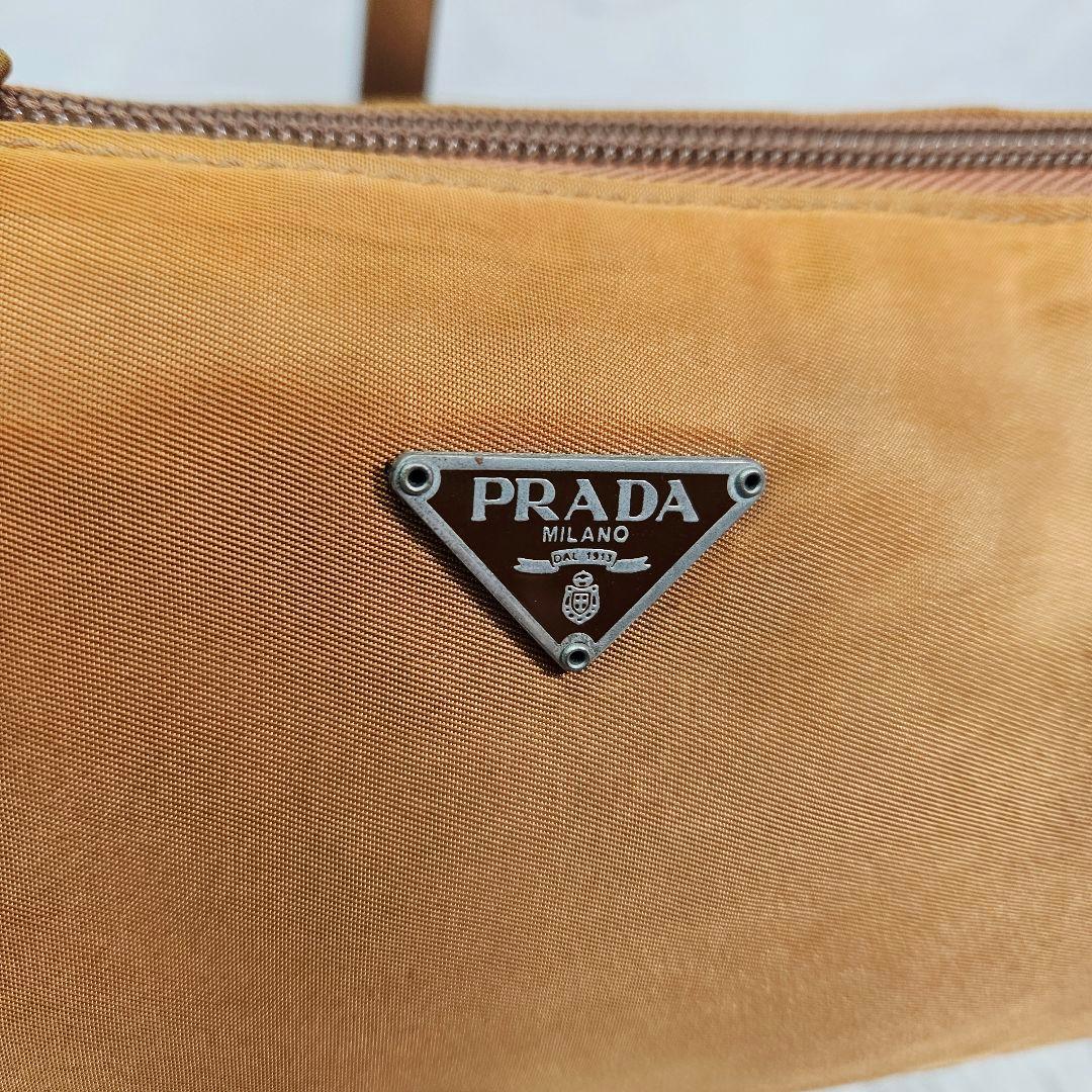 PRADA アクセサリーポーチ 三角ロゴ ナイロン オレンジ
