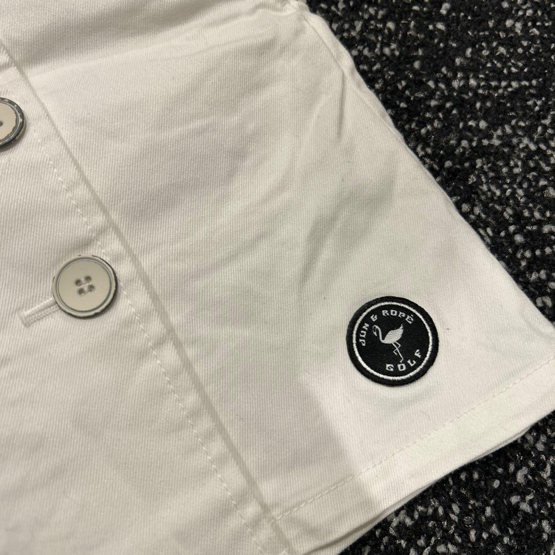 ポロシャツとボタン付きスカートのセット