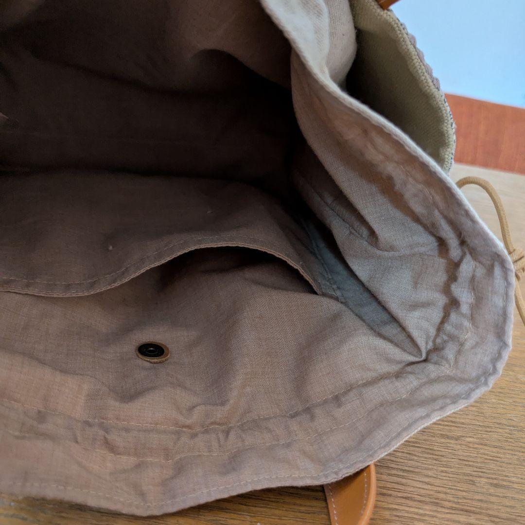 【1548】あおりポケットの巾着バッグ＊ミナペルホネン